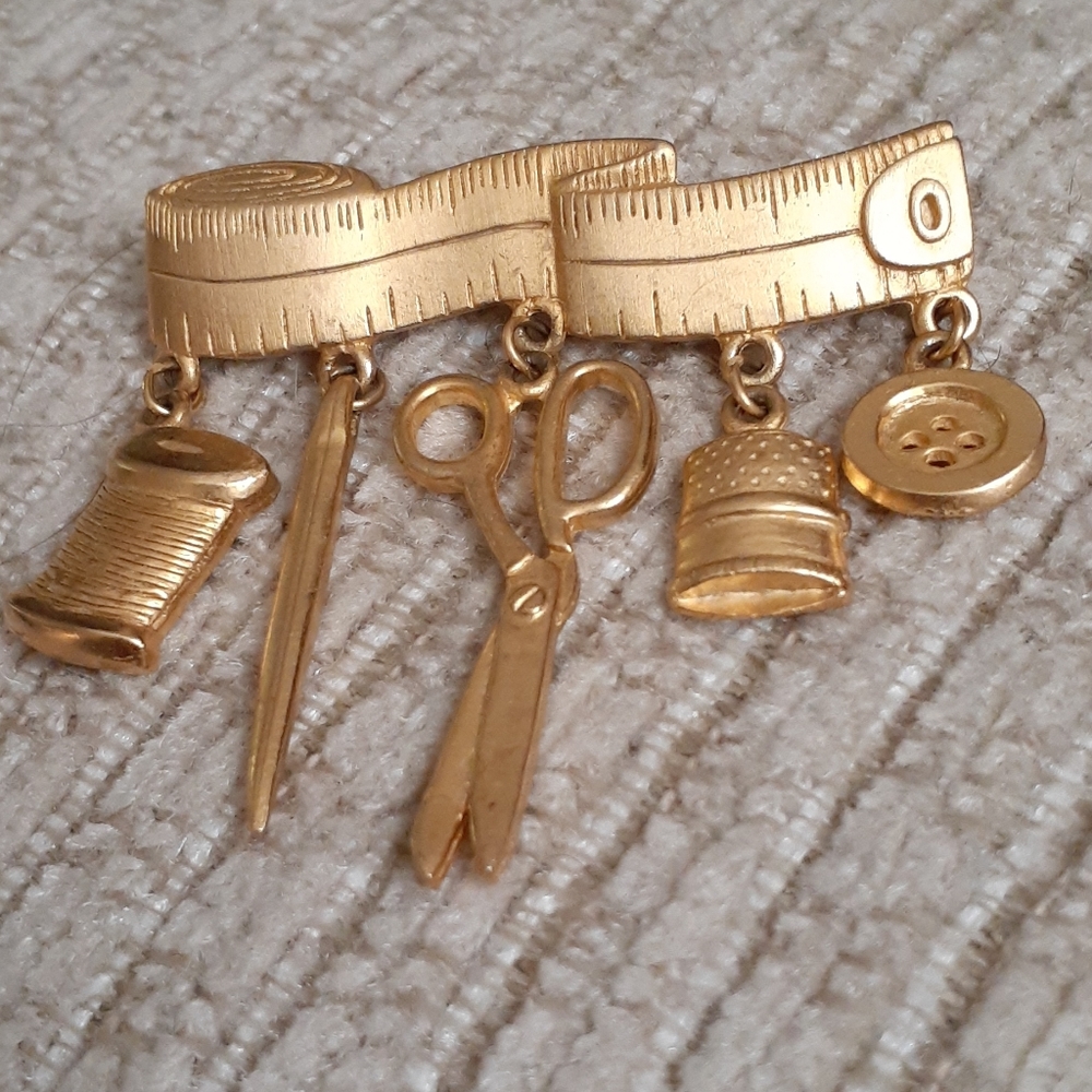 JJ seamstress brooch pin